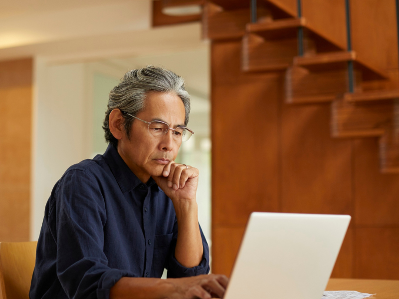 Middle-aged man thinknig joining a group, who keeps take control on their practice with SPP Dental Partners